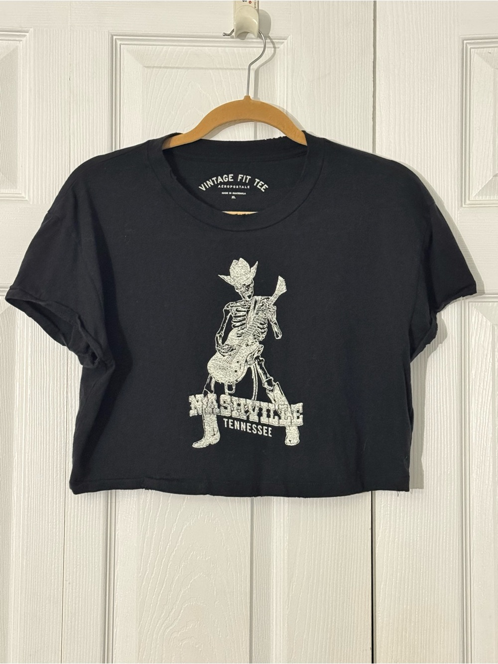 Aeropostale Black Cropped Tee with White Nashville Skeleton Graphic